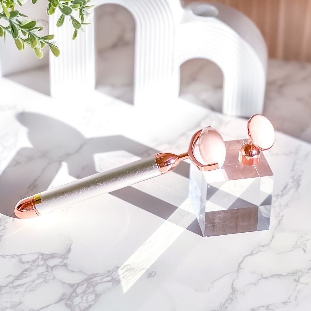 Natural Rose Quartz Face Roller Infused with Ultrasonic Energy Natural Rose Quartz Face Roller Infused with Ultrasonic Energy